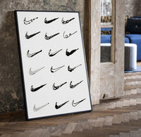 Nike Swoosh Hand-Drawn Sketch framed poster print in a black frame leaning beside a vintage door on parquet