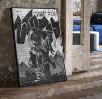 Travis Scott Utopia Album Cover framed poster print in a black frame leaning beside a vintage door on parquet