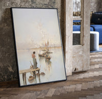 woman and dog on a dock watching sailboats vintage art print print in a black frame leaning beside a vintage door on parquet