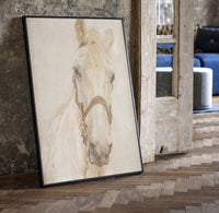 white horse head portrait with bridle vintage art print print in a black frame leaning beside a vintage door on parquet