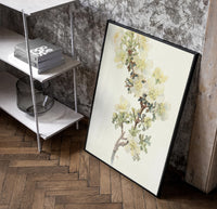 Cliff Rose botanical study with labeled names vintage art print poster in a black frame leaning beside a shelf in a…