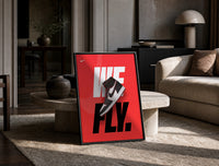 Nike Air Jordan 1 We Fly print on the floor, leaning against a travertine table