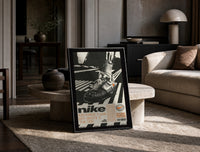 White Off-White Nike Air Force 1 framed poster print in a black frame leaning on a travertine table in a sunlit lounge