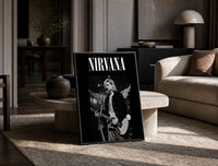 Kurt Cobain Nirvana Live print on the floor, leaning against a travertine table