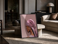 Black Woman in a Pink Durag print on the floor, leaning against a travertine table
