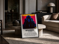 The Weeknd Starboy Album Cover print on the floor, leaning against a travertine table