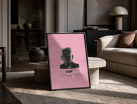 Tyler the Creator IGOR print on the floor, leaning against a travertine table