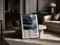 Drake Views CN Tower Tracklist print on the floor, leaning against a travertine table
