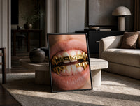 AMG Grillz Gold Grill print on the floor, leaning against a travertine table
