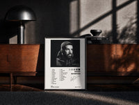 Black-framed Drake Scorpion Album Tracklist print on the floor in front of a dark wooden console