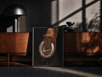 Black-framed Nike Horse Hoof Swoosh Equestrian print on the floor in front of a dark wooden console
