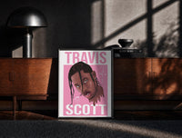 Black-framed Travis Scott Cactus Jack Portrait print on the floor in front of a dark wooden console