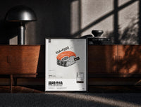 Black-framed SEAxFOOD Market Original Salmon Sushi print on the floor in front of a dark wooden console