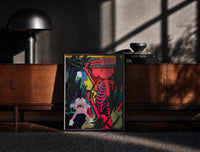 Black-framed KAWS Down Time Skeleton Companion print on the floor in front of a dark wooden console