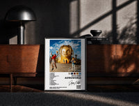 Black-framed Travis Scott Astroworld Album Cover print on the floor in front of a dark wooden console