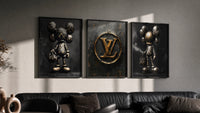 KAWS LV Gold Vault triptych in three black frames on a grey wall above a leather sofa
