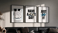 Nike "Have a Nice Day" triptych in three black frames on a grey wall above a leather sofa