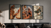 Luxury Lifestyle framed poster set of 3 triptych in three black frames on a grey wall above a leather sofa