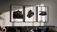 Air Jordan 1 Low Travis Scott triptych in three black frames on a grey wall above a leather sofa