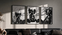 KAWS Est. 1999 Companion triptych in three black frames on a grey wall above a leather sofa