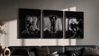 KAWS Neon Companions triptych in three black frames on a grey wall above a leather sofa