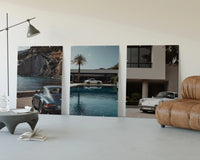Porsche 911 Coastal framed poster set of 3 three-panel set displayed beside a brown leather sofa