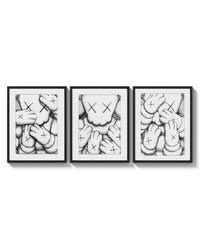 KAWS XX Crosshatch triptych arranged on a bright gallery wall