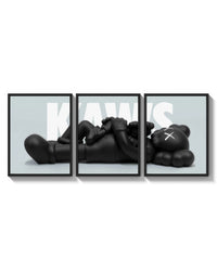 KAWS Reclining Companion triptych arranged on a bright gallery wall