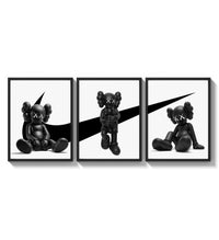 KAWS x Nike Monochrome Companion framed poster set of 3 three-panel set arranged as a triptych on a bright gallery wall