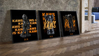 KAWS Signature Orange Edition three-piece set leaning on parquet beside a vintage loft door