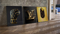 Louis Vuitton Pop Art three-piece set leaning on parquet beside a vintage loft door