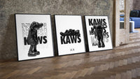 KAWS Legacy Archive three-piece set leaning on parquet beside a vintage loft door
