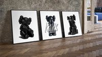Blackout XX KAWS three-piece set leaning on parquet beside a vintage loft door