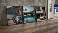 Porsche 911 Coastal framed poster set of 3 three-piece set leaning on parquet beside a vintage loft door