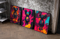 KAWS Chromatic Graffiti set of three black-framed prints leaning against a raw-plaster wall