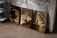 Leopard Print Still Life set of three black-framed prints leaning against a raw-plaster wall