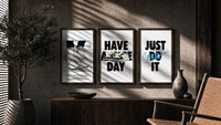 Nike "Have a Nice Day" triptych in three walnut frames above a sideboard in a warm room