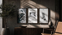 Nike AF1 White triptych in three walnut frames above a sideboard in a warm room