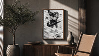 KAWS Companion Air Jordan Sneakers framed poster poster framed above a fluted sideboard beside an olive tree