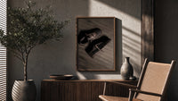Air Jordan 1 x Travis Scott Velvet Brown Mocha poster framed above a fluted sideboard beside a potted tree