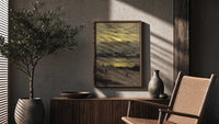 beach at sunset with silhouetted figures vintage art print poster framed above a fluted sideboard beside an olive tree