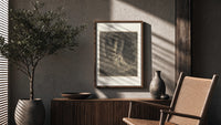 Dore Dante in the Dark Wood poster framed above a fluted sideboard beside a potted tree