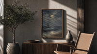 tall ship at sea under full moon vintage art print poster framed above a fluted sideboard beside an olive tree