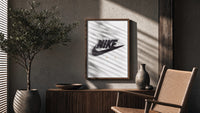 Nike Just Do It Swoosh framed poster poster framed above a fluted sideboard beside an olive tree