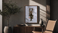 Kendrick Lamar DAMN Collage poster framed above a fluted sideboard beside a potted tree