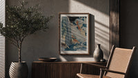 Hokusai Ono Waterfall Kiso Road poster framed above a fluted sideboard beside a potted tree