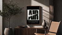 Nike Air History framed poster poster framed above a fluted sideboard beside an olive tree