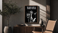 Kurt Cobain Nirvana Live poster framed above a fluted sideboard beside a potted tree