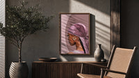 Black Woman in a Pink Durag poster framed above a fluted sideboard beside a potted tree