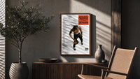 Travis Scott Rodeo Anniversary poster framed above a fluted sideboard beside a potted tree